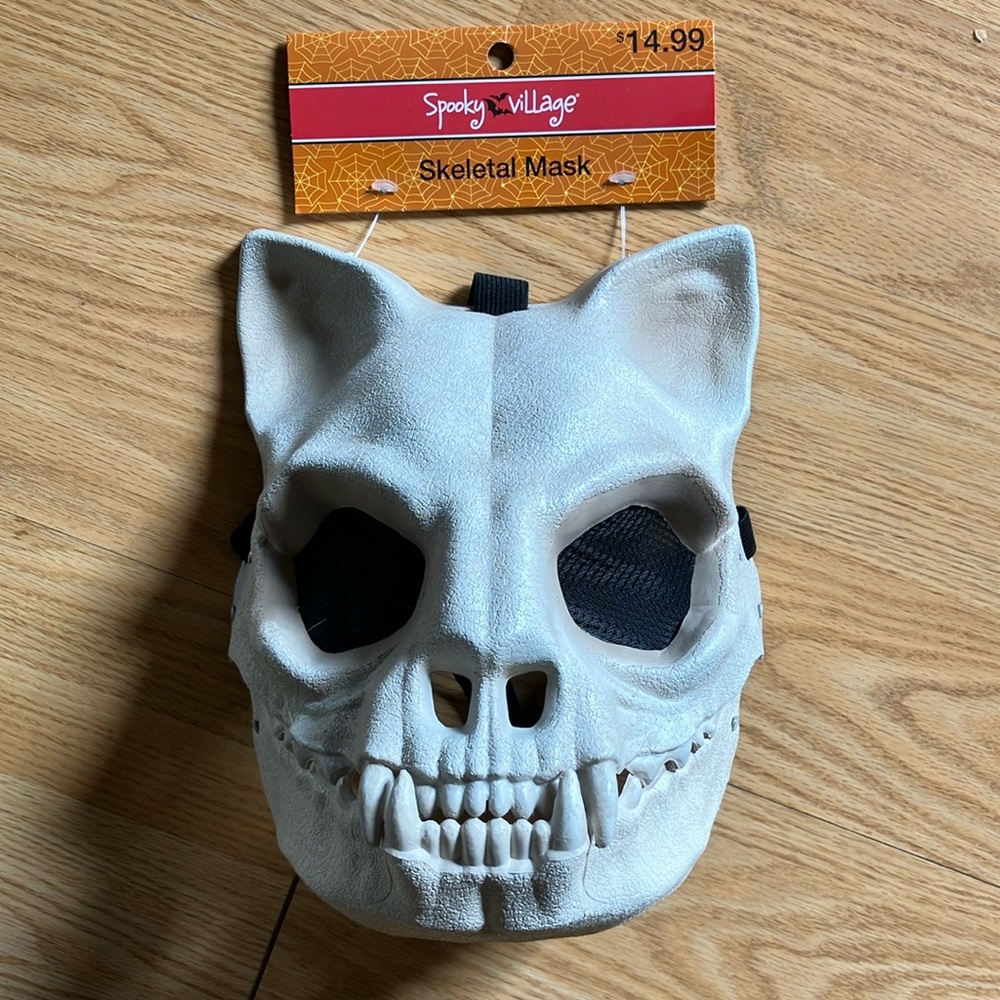White and Black Face Mask with Skull Design